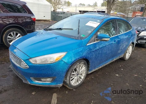 2017 Ford Focus Titanium z USA, uszkodzony, nr VIN 1FADP3J2XHL264244